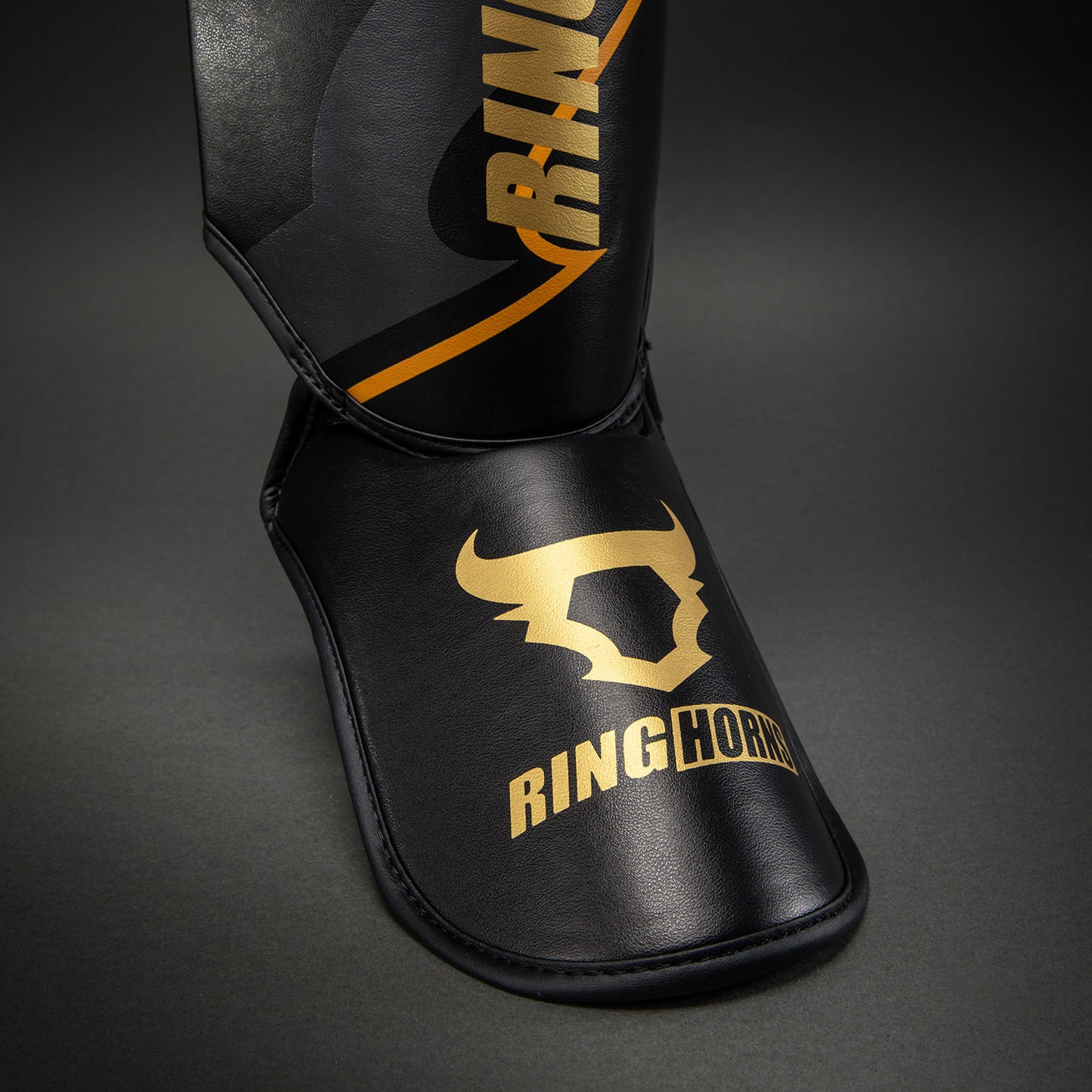 Ringhorns Charger by Venum Shin Guards - Black/Gold
