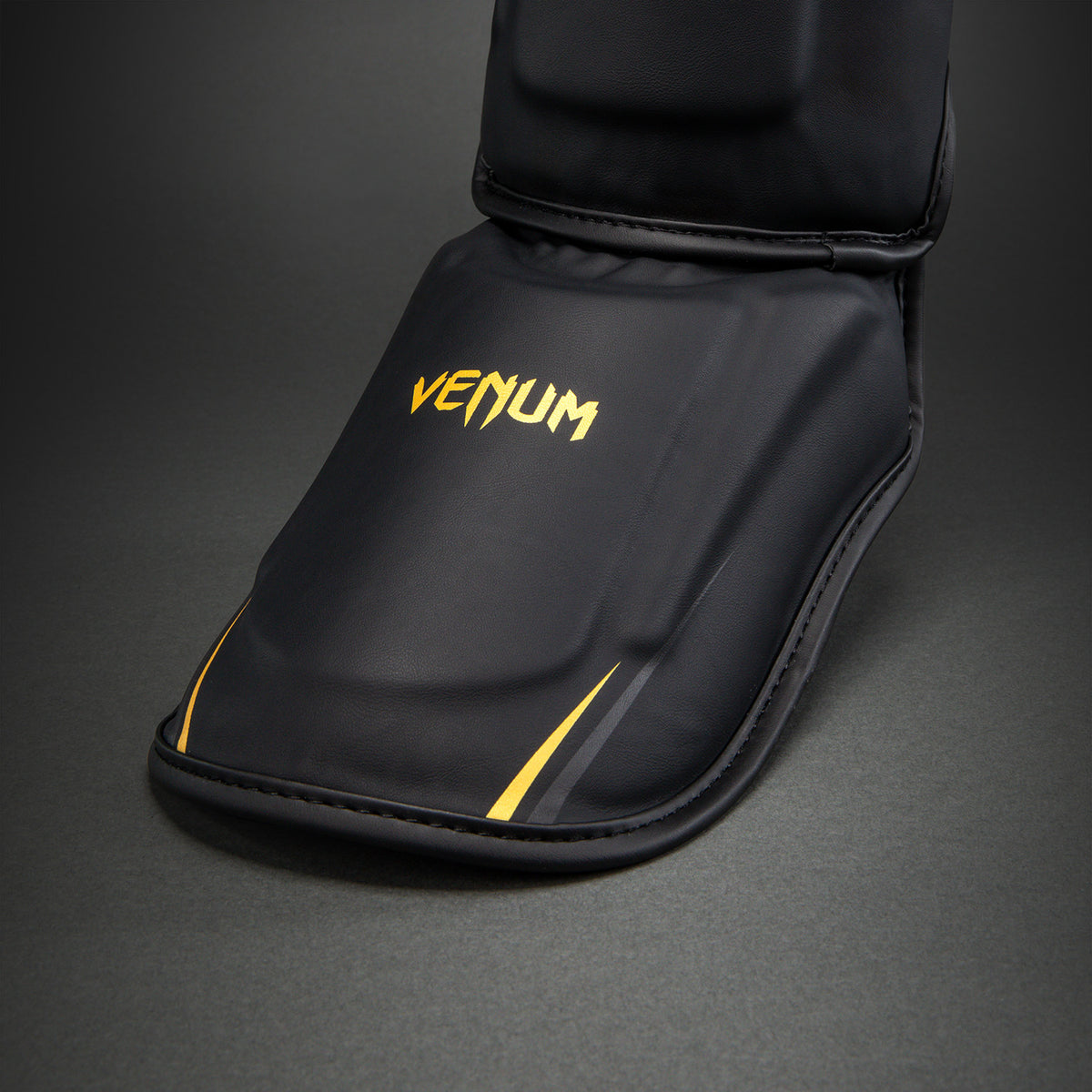Venum G-Core Shin Guards - Black/Gold