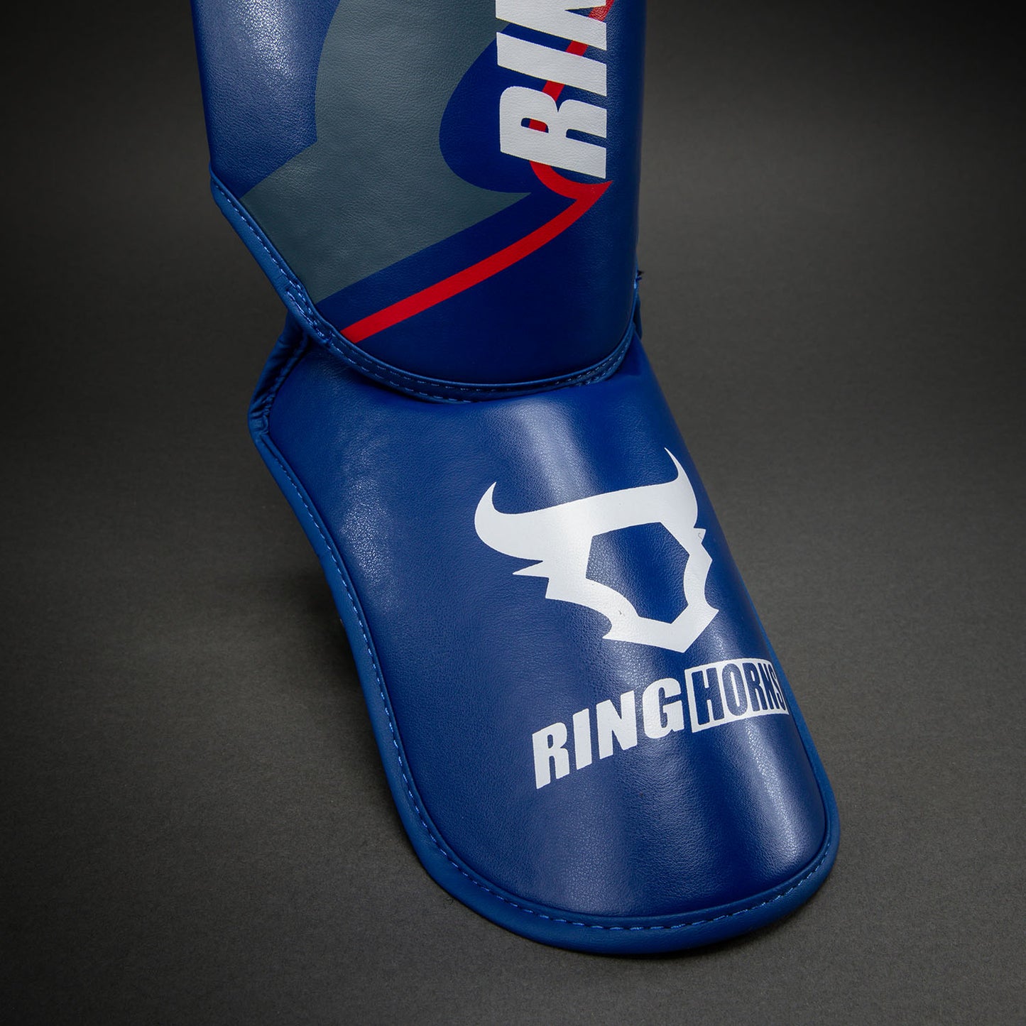Ringhorns Charger by Venum Shin Guards - Navy Blue/Red