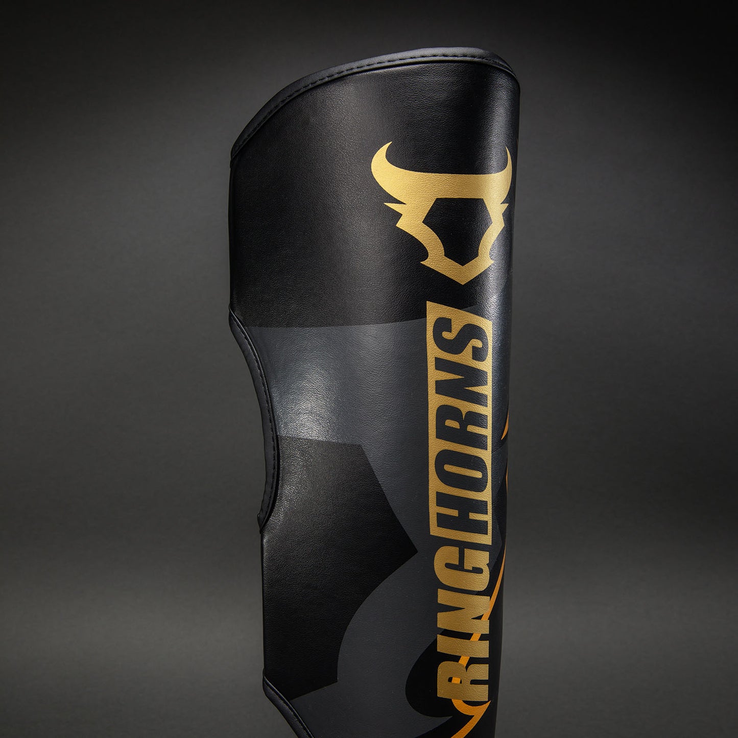 Ringhorns Charger by Venum Shin Guards - Black/Gold