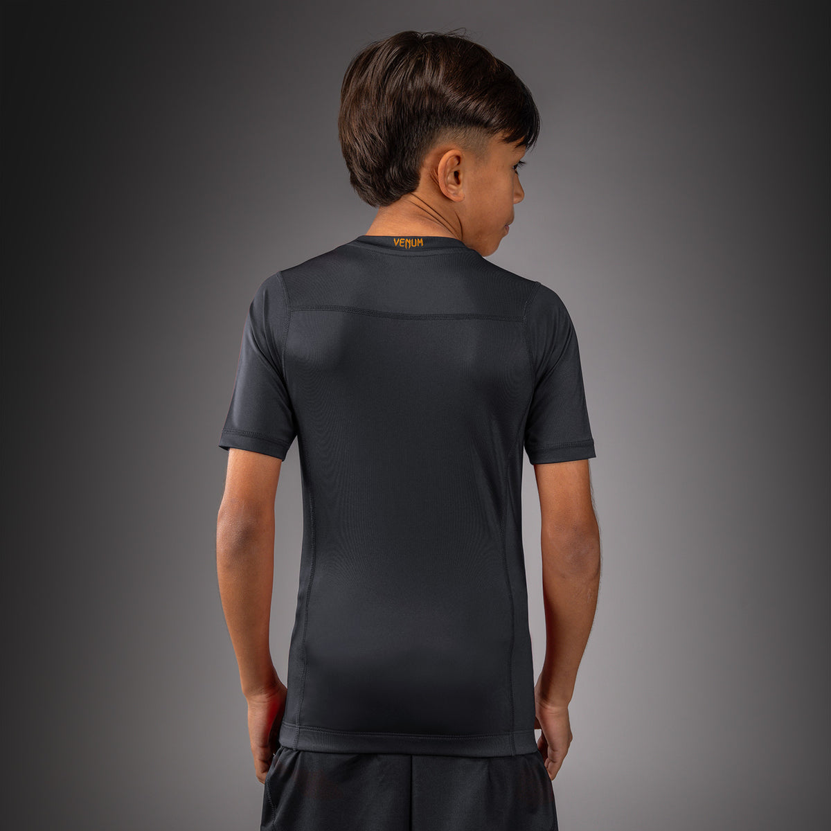 Venum Attack Short Sleeve Rashguard for Kids - Black/Gold