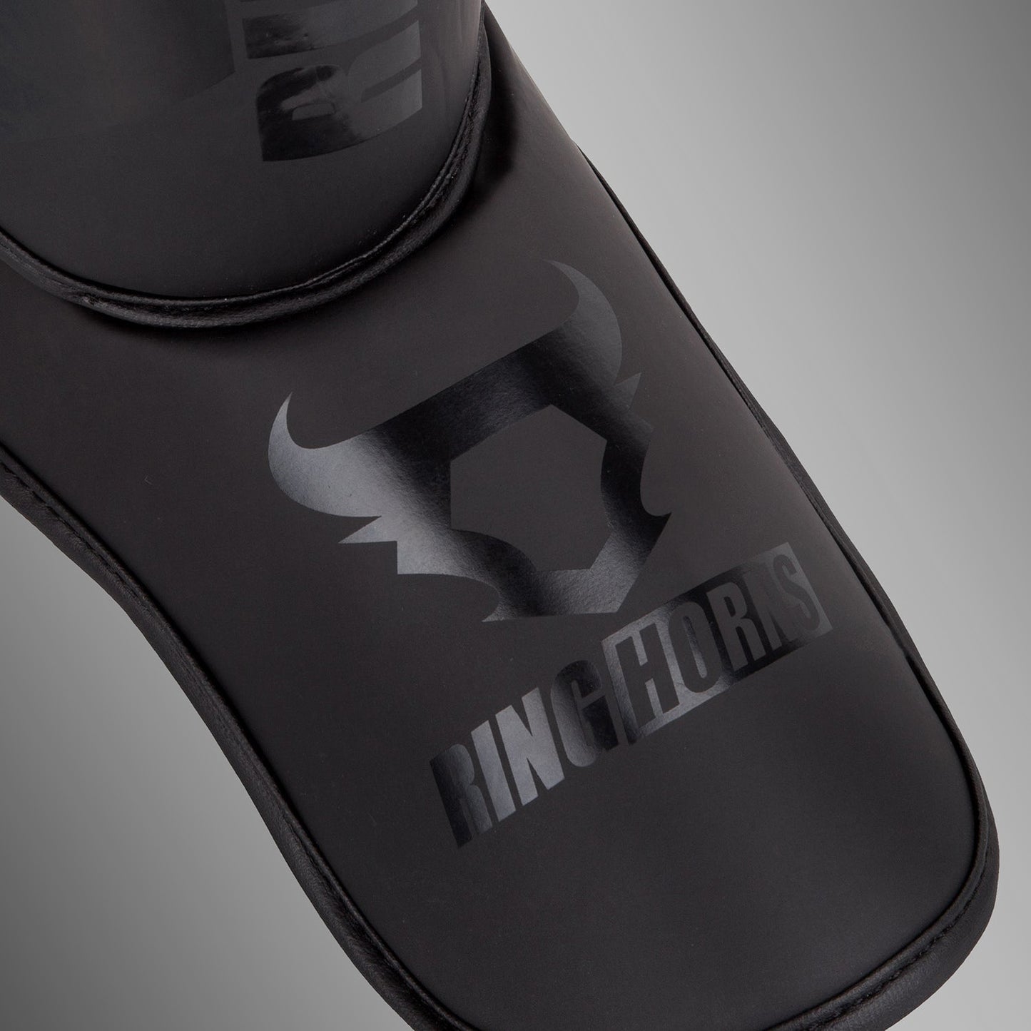 Ringhorns Charger by Venum Shin Guards and Foot Protectors - Black/Black